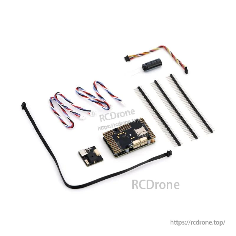 Flight controller package contents with cables, headers, USB board, capacitor and mounting hardware