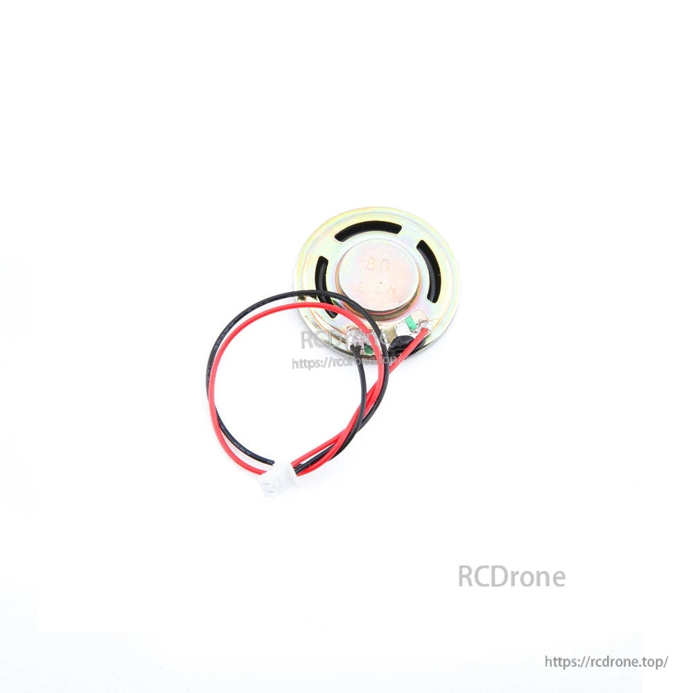 Rear view of round speaker driver with vented metal frame, solder tabs, and red/black wiring