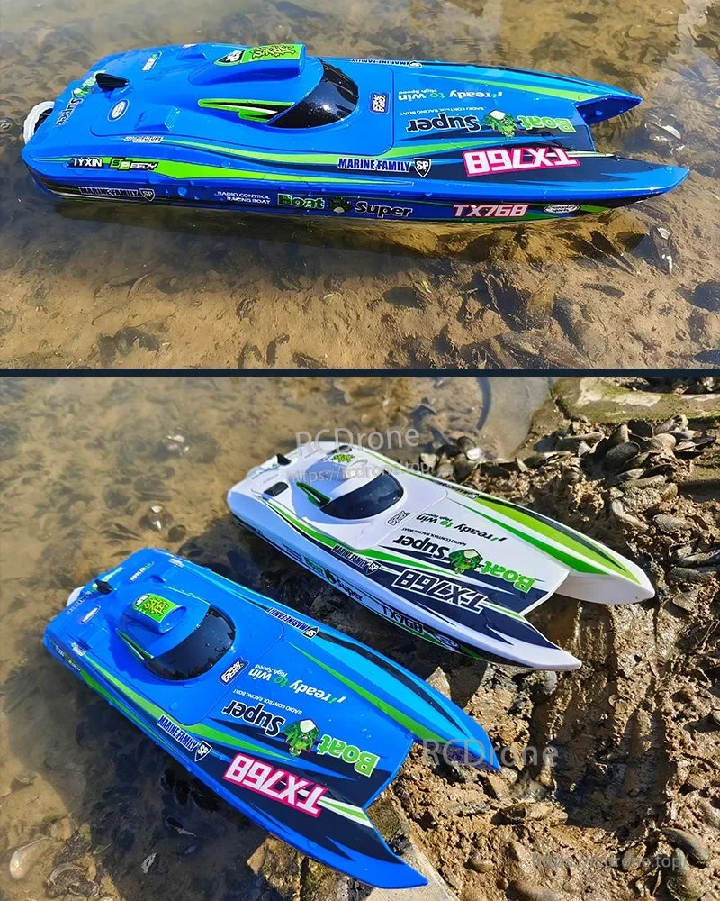 The TX768 RC boat, in blue and white with green accents, features racing-themed text and is designed for high-speed water performance.