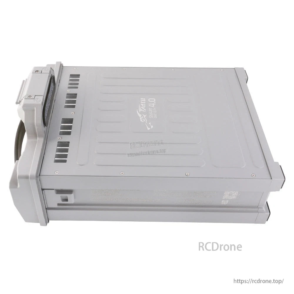Tattu 4.0 smart LiPo UAV battery pack in a rugged gray metal housing with integrated end connector/handle