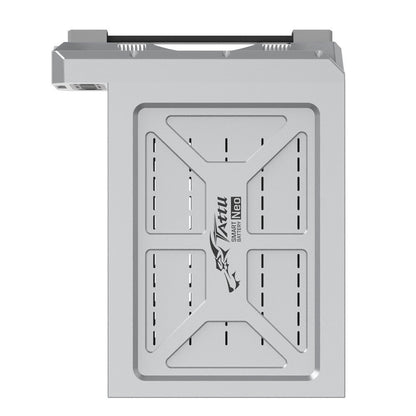 Tattu NEO smart battery pack in a silver metal case with recessed X-panel design and integrated top handle