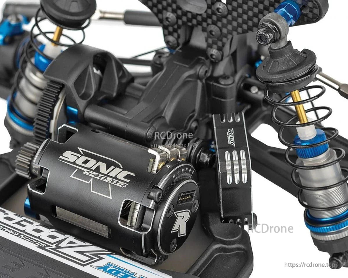 Close-up of Team Associated RC10B7.1 buggy drivetrain with Reedy Sonic 540-M4 motor, gears and rear shocks