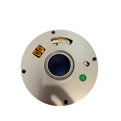 Top face view of joint motor module showing center bore, power connector and small signal ports