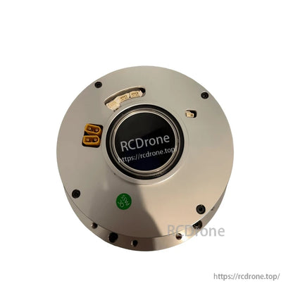Top view close-up showing yellow power connector, small signal ports, and central opening
