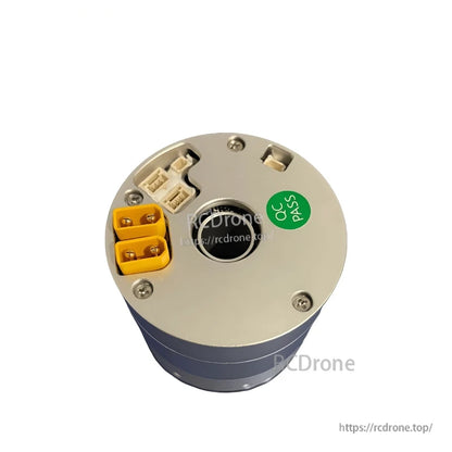 Top connector close-up with QC PASS sticker, yellow power plugs, and white signal connectors