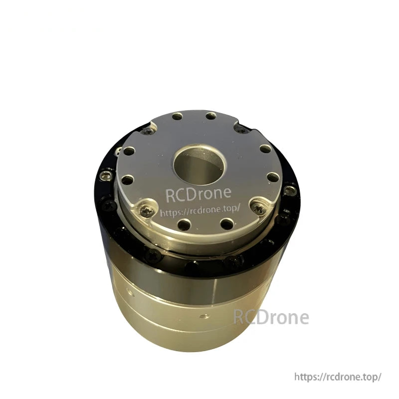 Close-up angled top of output flange with center hole and bolt circle on joint motor module