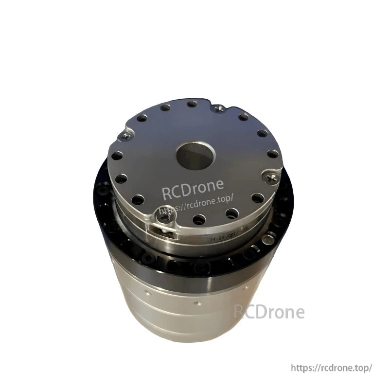 Angled top perspective showing circular bolt pattern, black ring, and central hole on joint module