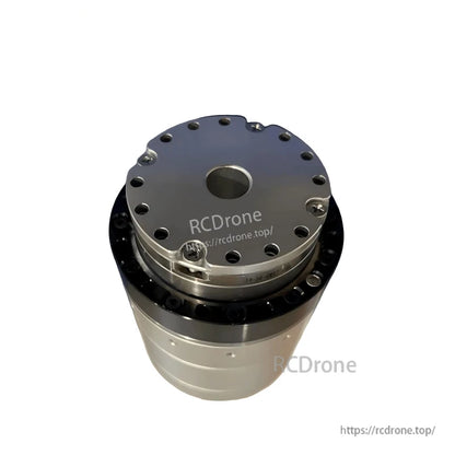 Angled top perspective showing circular bolt pattern, black ring, and central hole on joint module
