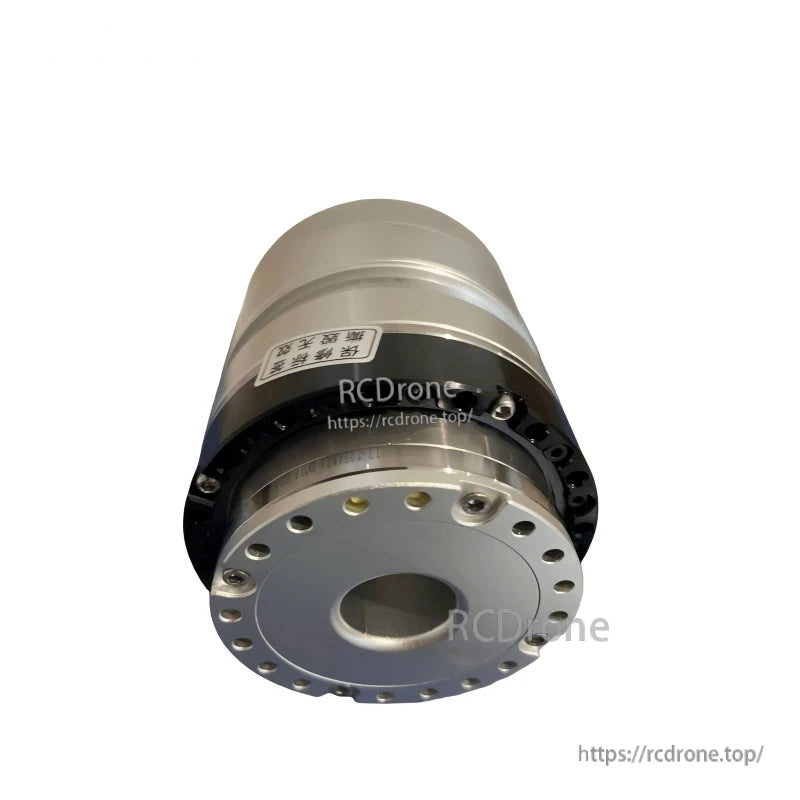 Bottom and side angle showing the flange fasteners and through-hole, with housing and black band visible