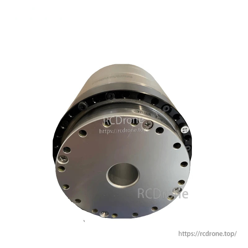 Underside close-up of circular mounting plate, center bore, and perimeter fasteners