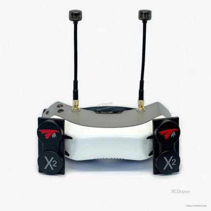 FPV goggles setup with two TrueRC Core antennas on top and X2 patch antennas on the front mounts