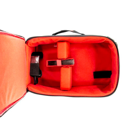 Open bag interior with red padded lining, foam blocks and securing strap for RC transmitter
