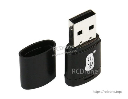 USB-A connector close-up on the mini card reader with removable cap shown beside