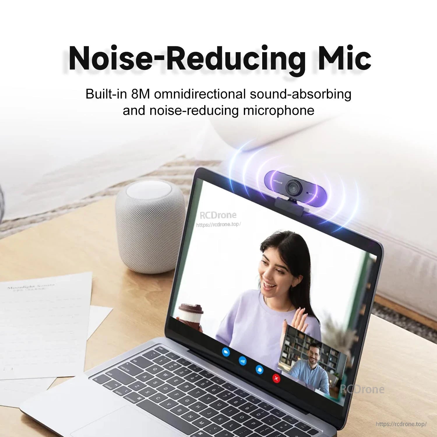 Laptop video call scene showing built-in noise-reducing microphone pickup illustration above the webcam