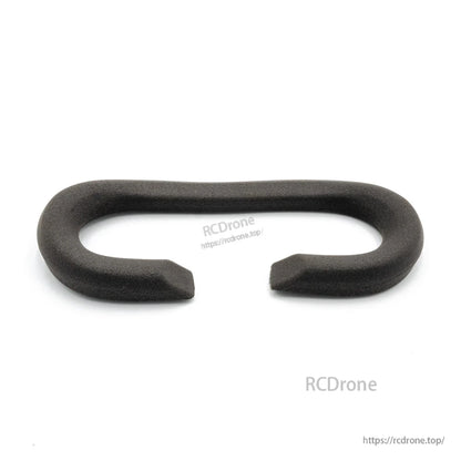 Grey foam padding ring for DJI goggle, top view with centered opening and U-shaped cutout
