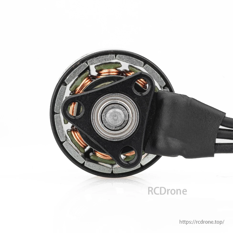 Bottom view of motor base with central bearing and three mounting holes for micro FPV drone frames