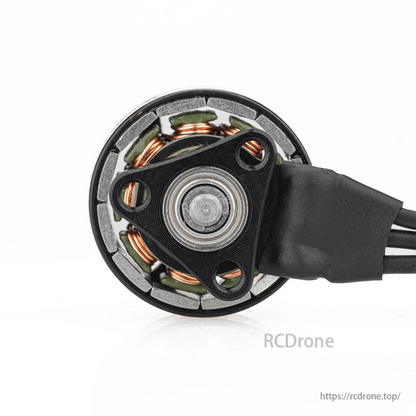 Bottom view of motor base with central bearing and three mounting holes for micro FPV drone frames