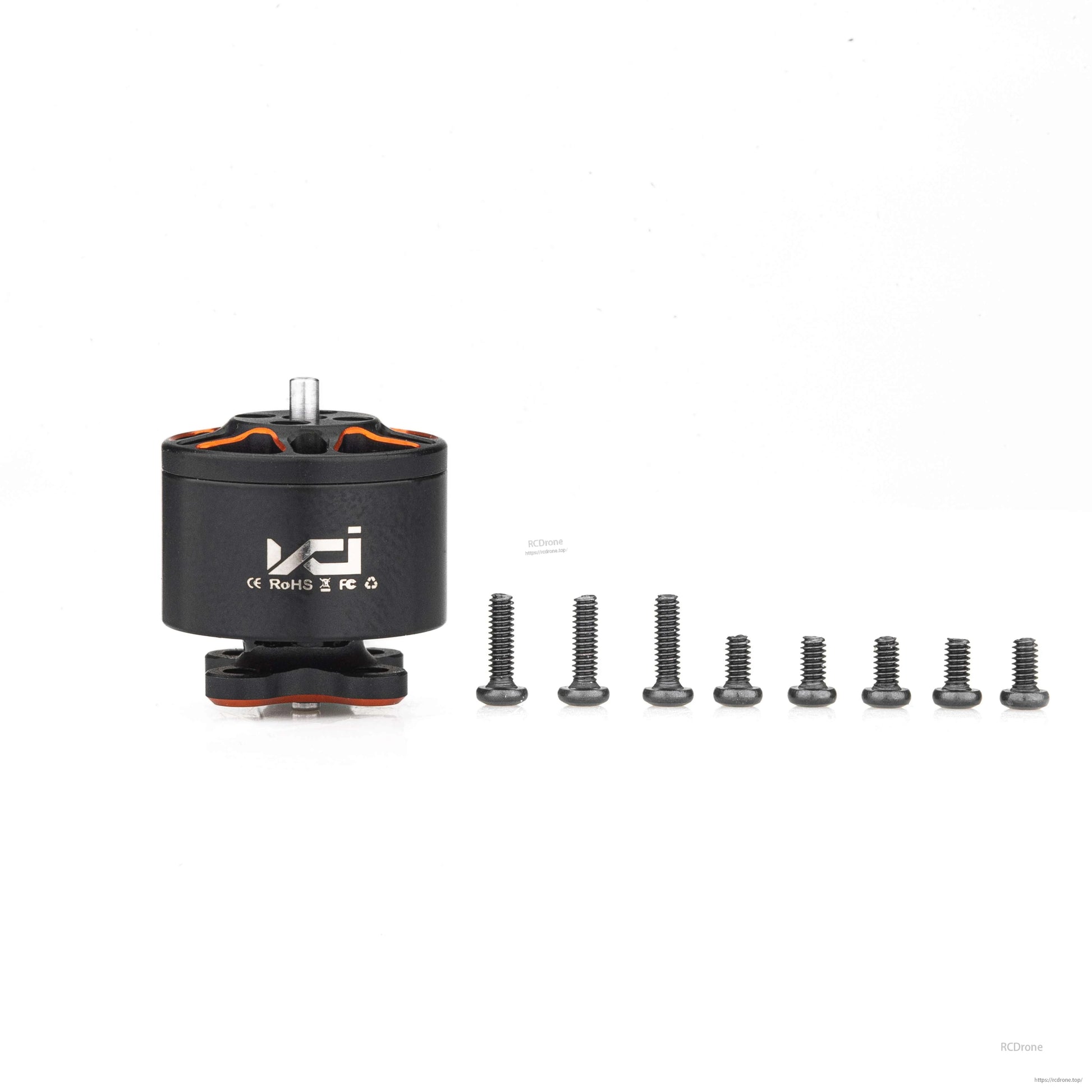 VCI SPARK 1106 brushless motor with included mounting screws, shown as package contents