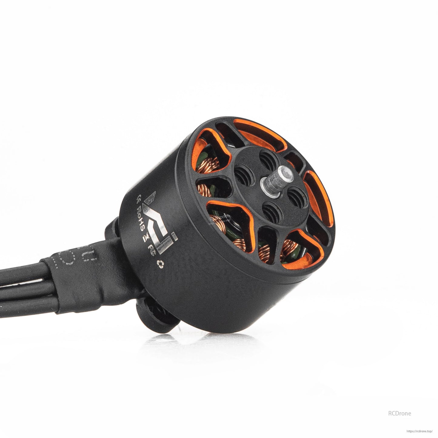 Angled close-up of motor bell and shaft, showing orange accents and wire lead exit