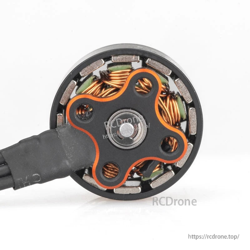 Bottom view of motor base with four-arm mount pattern and exposed stator windings