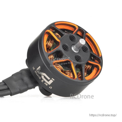Angled view of VCI SPARK 1204 motor showing shaft, mounting holes, and wire lead