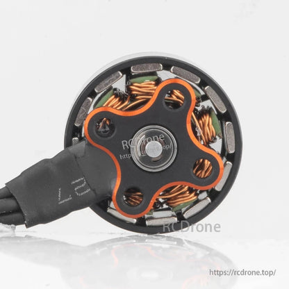 Bottom view of SPARK 1206 motor showing mounting base pattern and visible copper windings