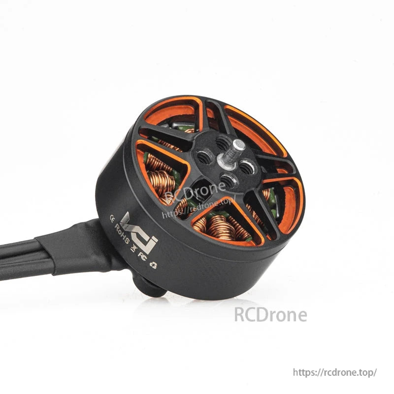Angled view of SPARK 1606 brushless motor showing bell vents, shaft, and side branding