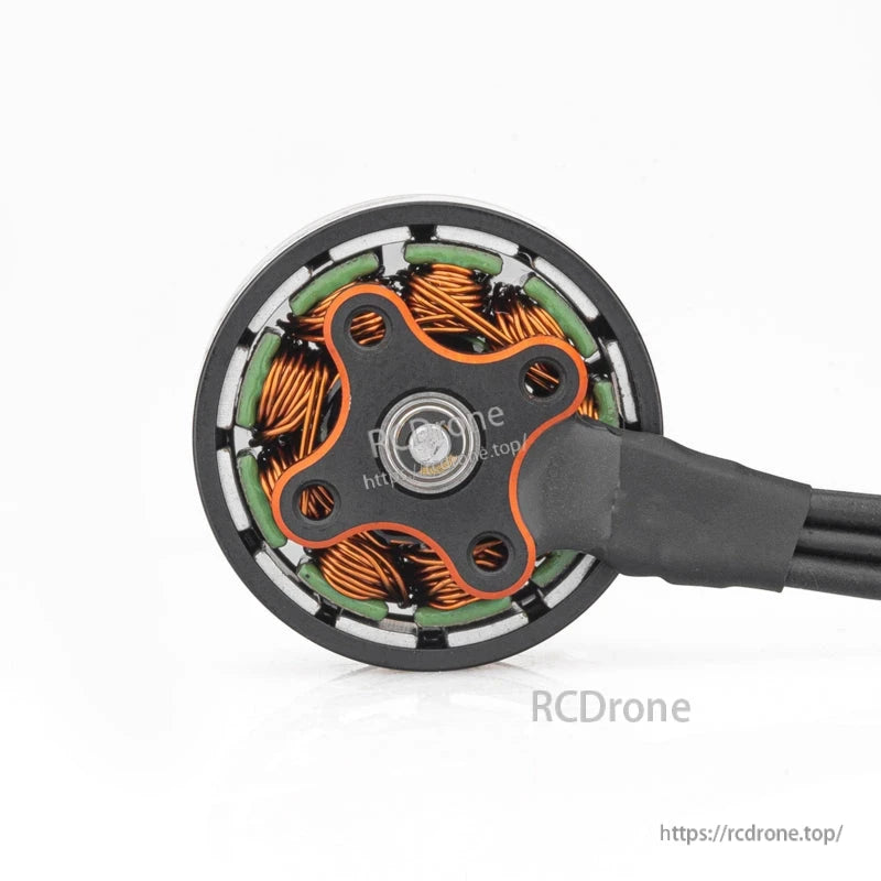 Bottom view of motor base plate showing mounting holes, bearing center, and copper windings