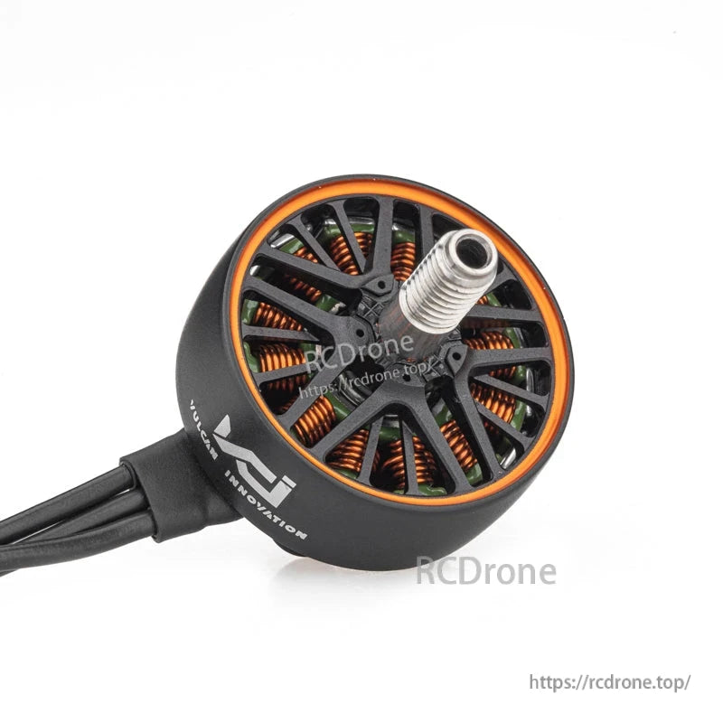 VCI SPARK 2306.5 brushless motor angled view highlighting threaded shaft, orange accent ring, and windings