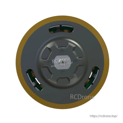 Top view of the outrunner motor bell with ventilation cutouts and gold rim detail