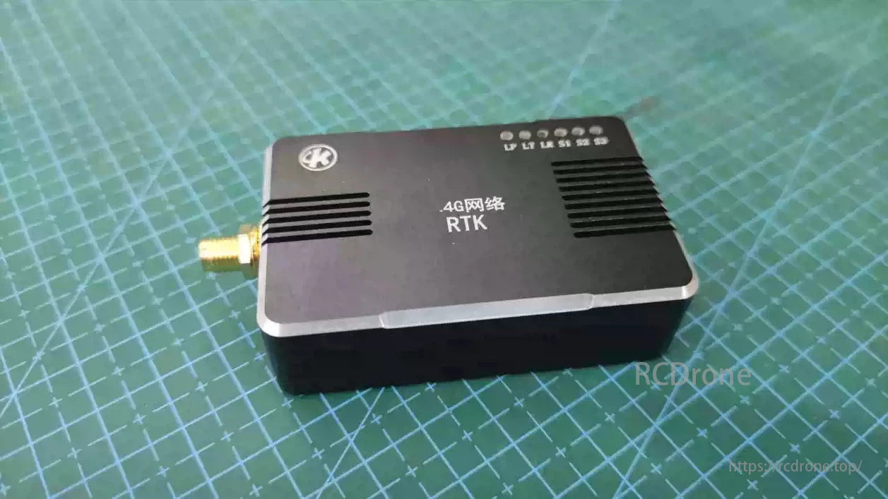 VK R2 Data Link: 4G RTK module for UAV/GNSS systems, featuring compact design, antenna port, and indicator lights for reliable connectivity.