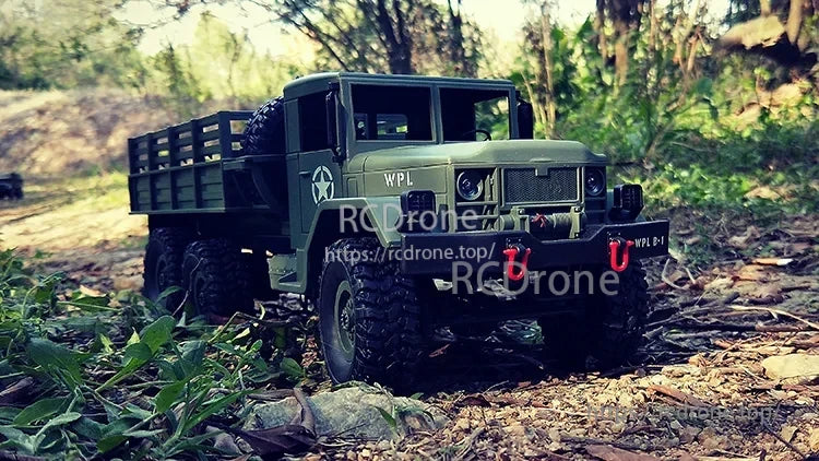 WPL B16 1:16 6WD Rc Car, RC car with 6WD, brushed motor, remote control, and rechargeable battery for off-road trail driving and crawling.