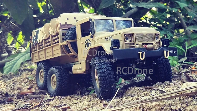 WPL B16 1:16 6WD Rc Car, Brushed motor and 2.4GHz radio provide precise control, while LED lighting enhances nighttime driving capabilities.