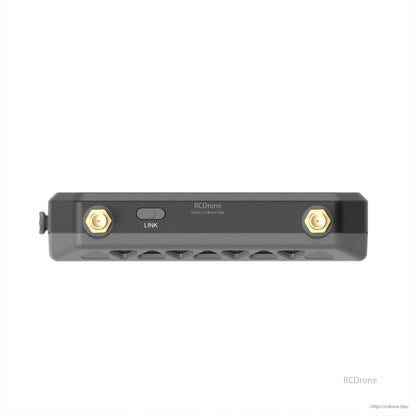 Antenna connector side view with two gold RF ports and LINK button on the receiver