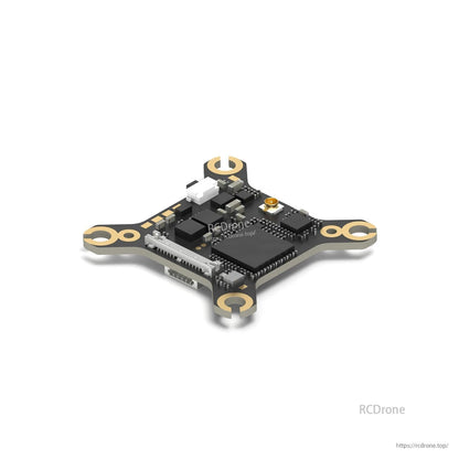 Angled close-up of Walksnail Ascent Lite VTX board showing chips, connector ports, and mounting corners