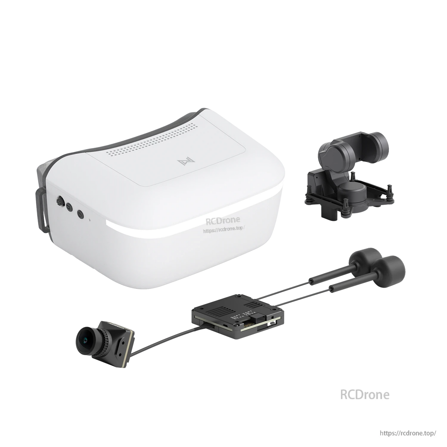 White FPV goggle kit components laid out: goggles, camera, receiver board and antennas (RCDRone watermark)