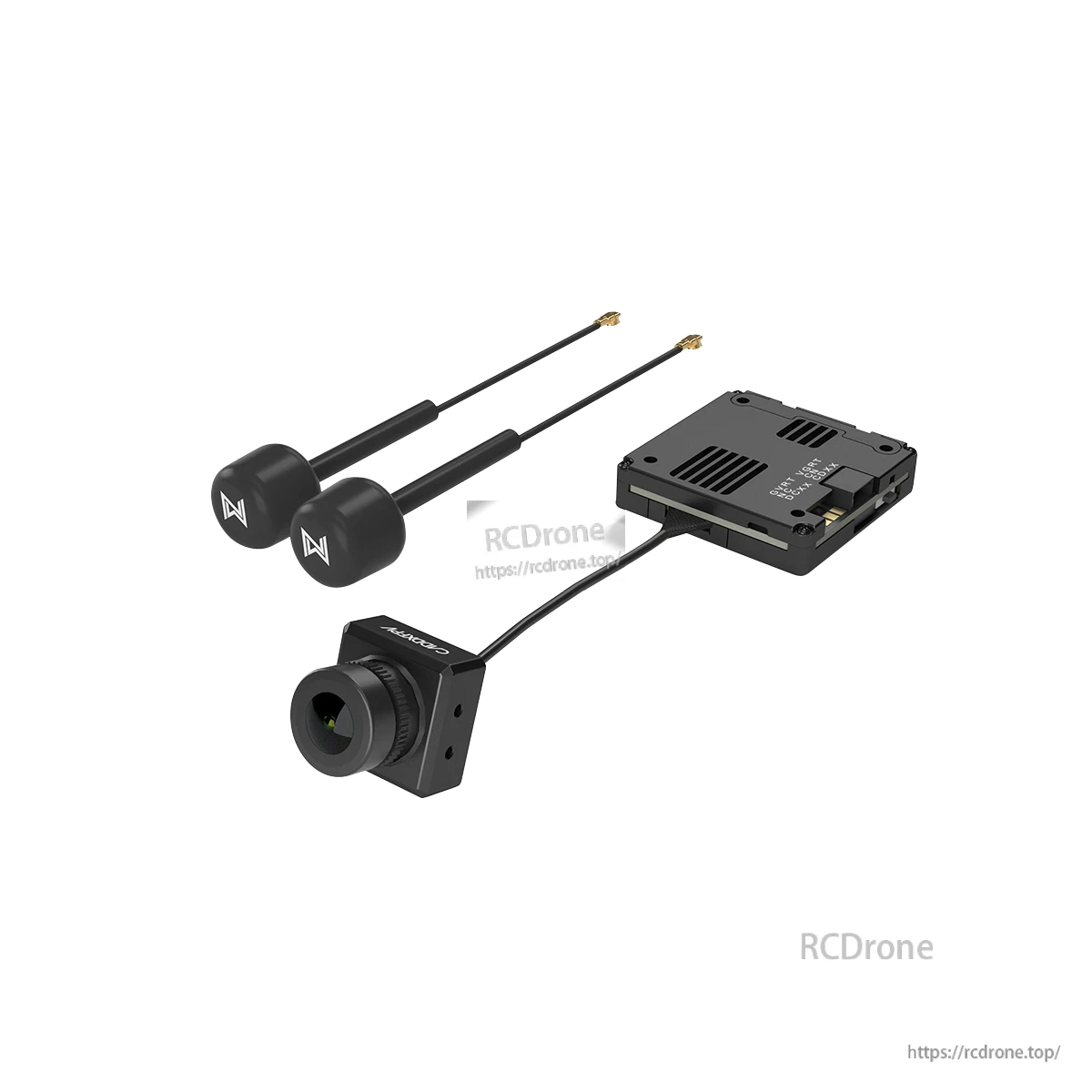Included kit parts close-up: FPV camera, module unit, and two antennas for the goggles
