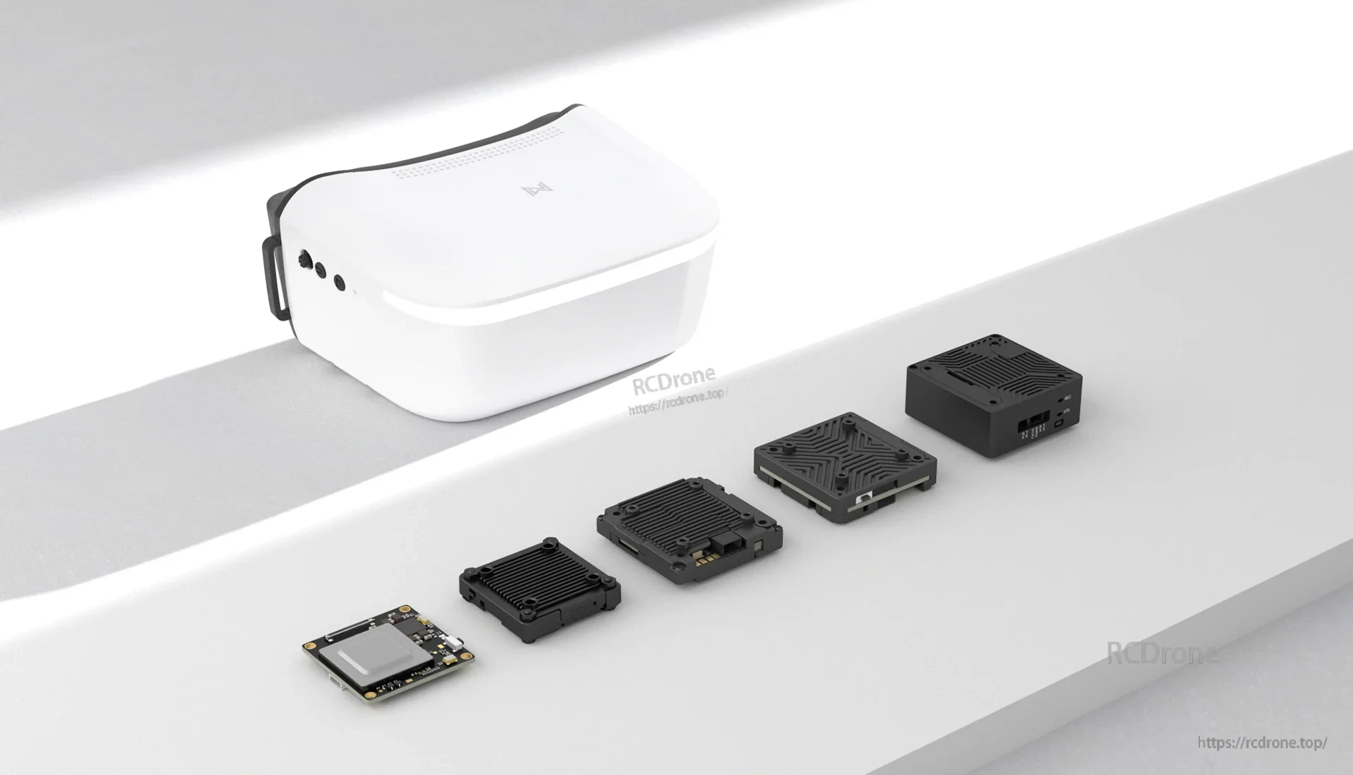Walksnail goggles with multiple Walksnail Avatar VTX module styles laid out for compatibility
