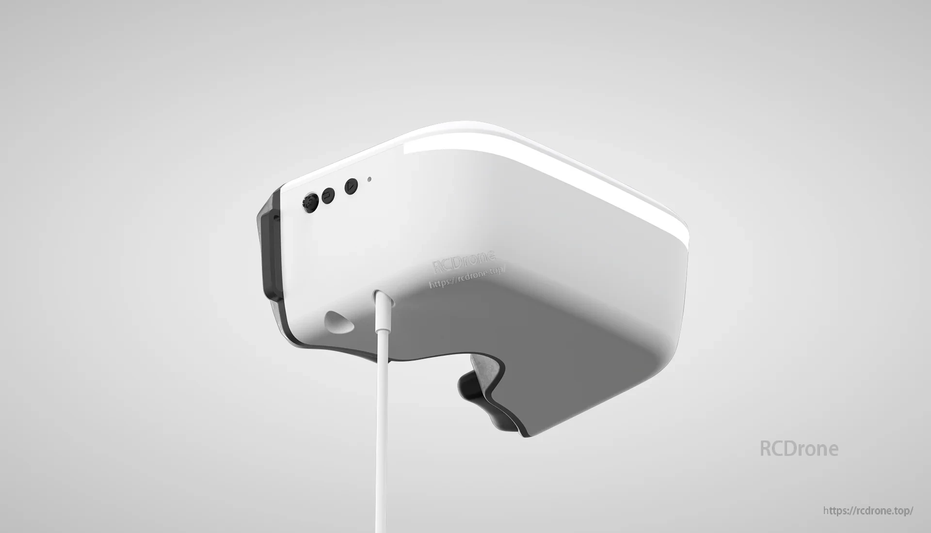 Side view of the goggles with power cable connected and control buttons visible