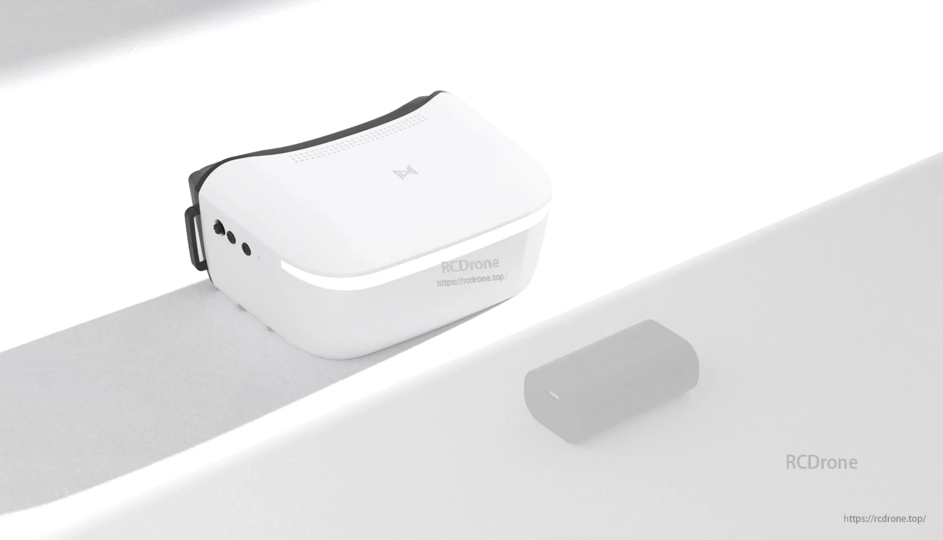 Top angled view highlighting the compact shell and front light strip