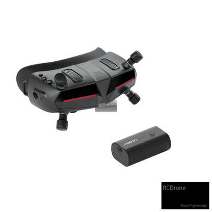 Angled top view of FPV goggles and battery pack with RCDRONE watermark and website text
