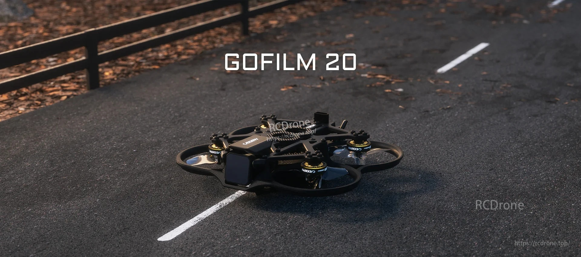 CaddxFPV Gofilm 20 small FPV drone on a road surface with 'GOFILM 20' text