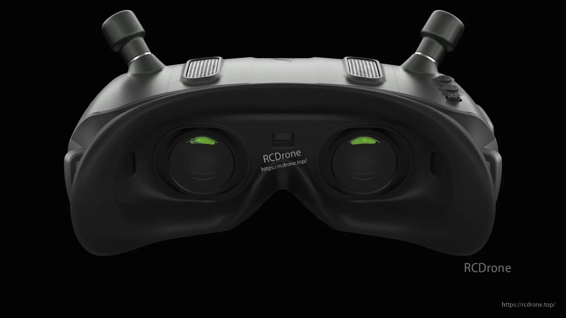 Interior view of the goggles showing lens assembly and top buttons for menu/control access