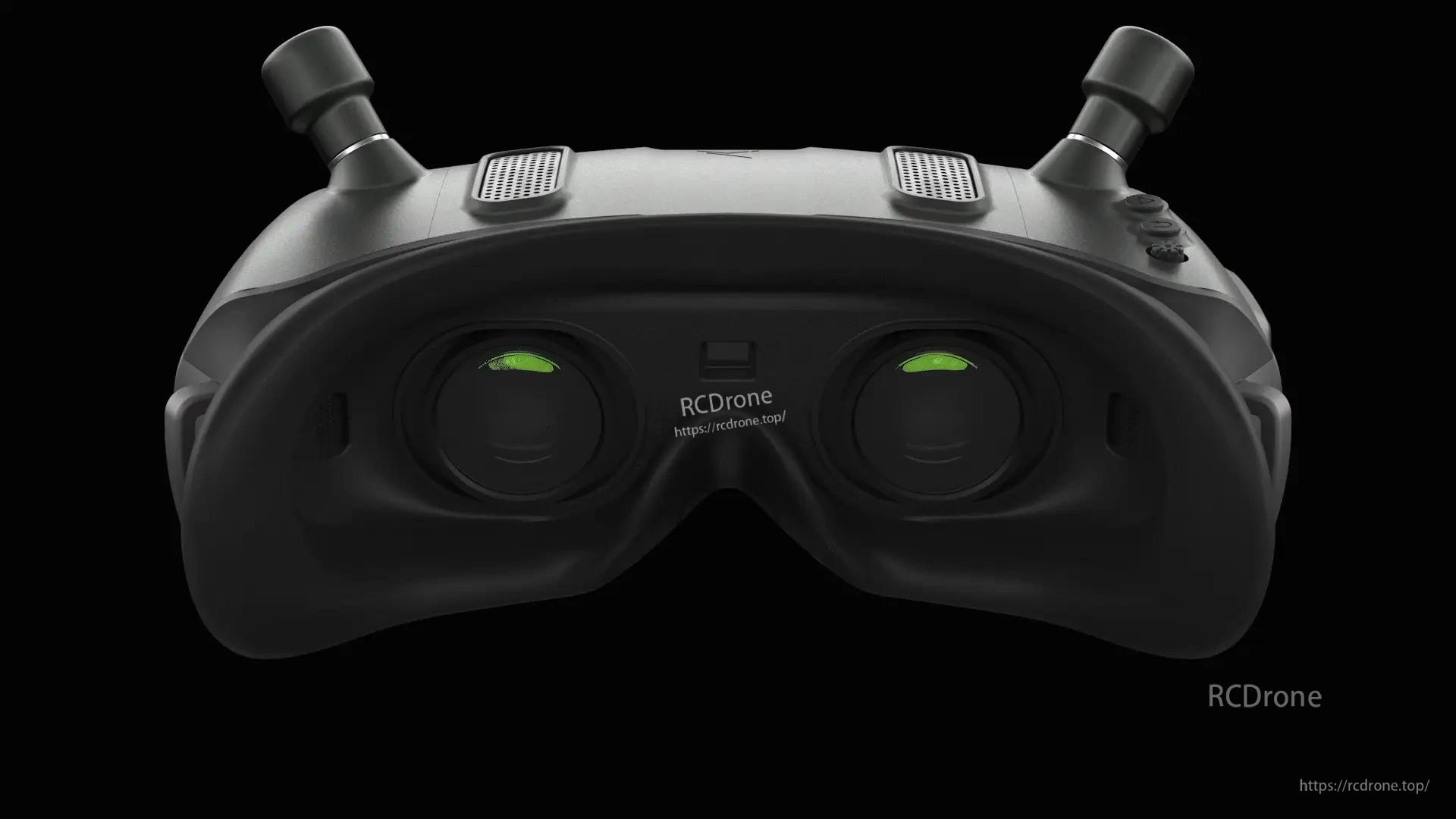 Front view of goggles with two antennas and top buttons, showing the overall faceplate and housing shape