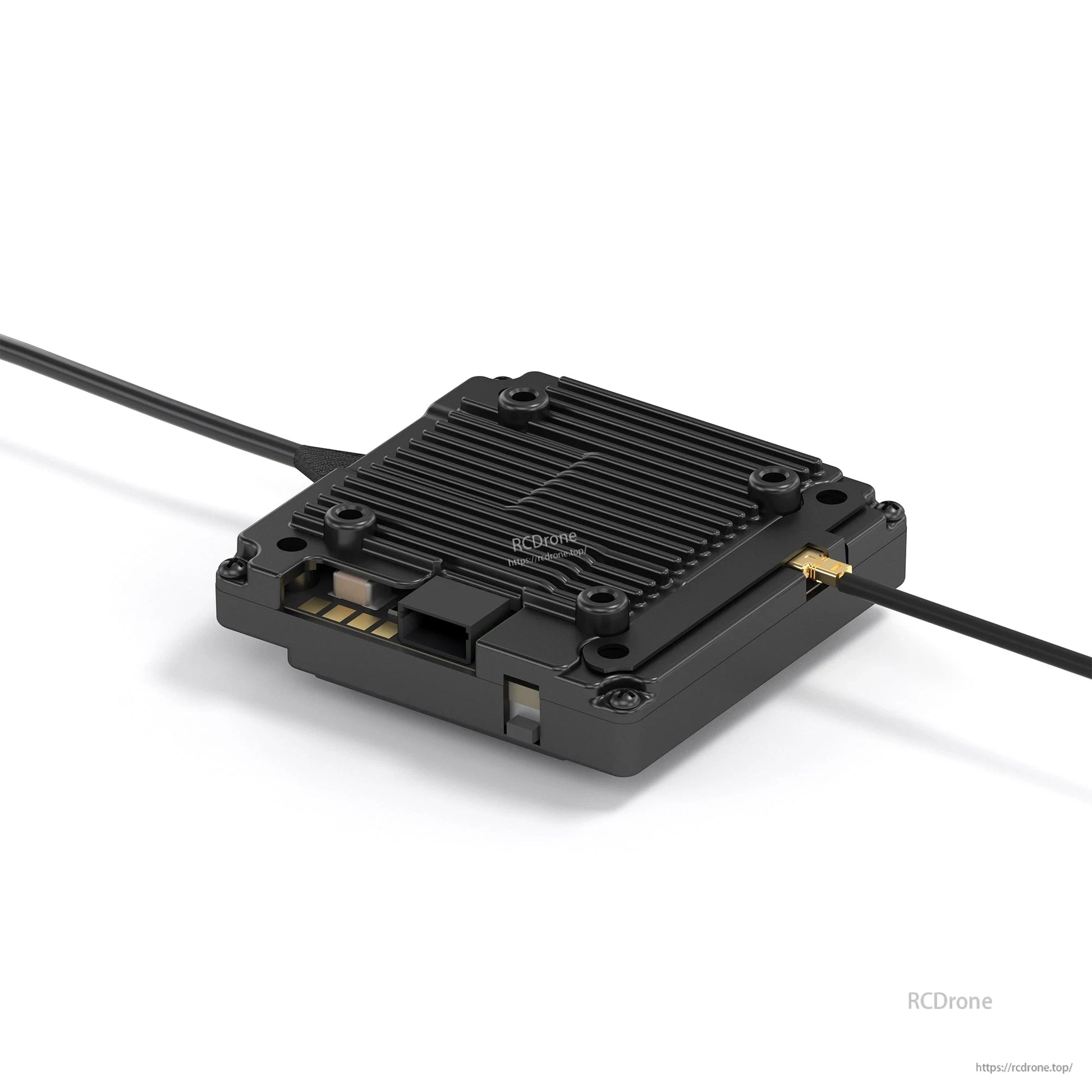 Video transmitter module close-up with finned heatsink housing and antenna connector