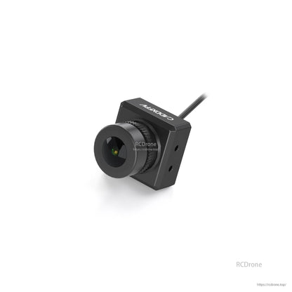 Black housing FPV camera three-quarter view on white background, lens focus and square body
