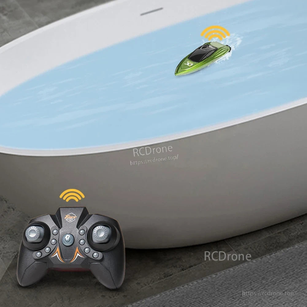 Waterproof 2.4GHz Mini RC Boat, Miniature RC boat with waterproof design and dual-speed control, suitable for use in bathtubs or pools.