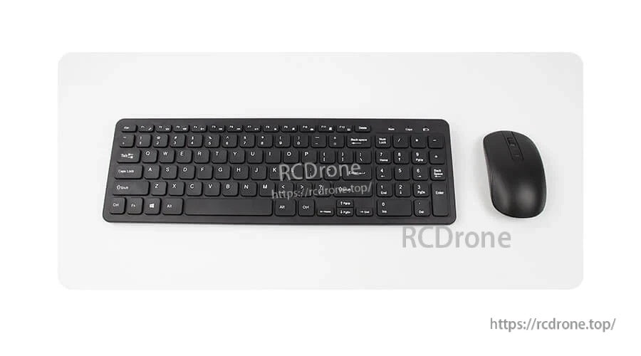 Full view of wireless keyboard and mouse set on white background