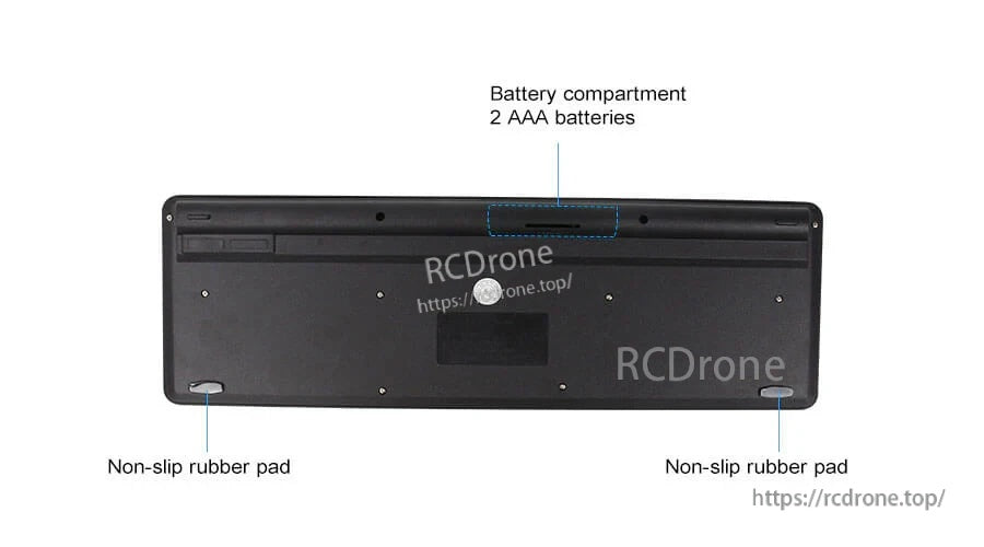 Underside of keyboard with non-slip rubber pads and 2×AAA battery compartment