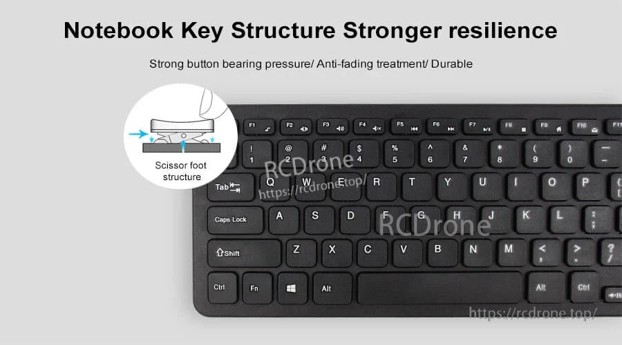 Close-up of scissor-foot (X-structure) keyboard keys with chocolate keycaps for quiet, resilient typing